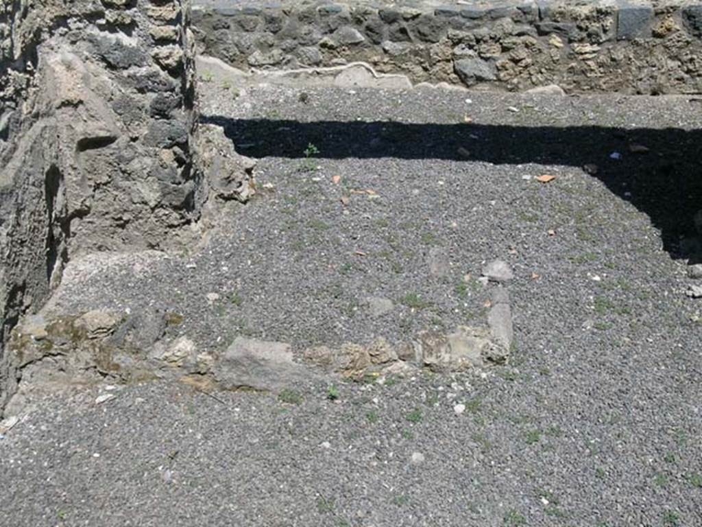 I.21.4 Pompeii. June 2005. Looking north to remains of shop counter near doorway.
Photo courtesy of Nicolas Monteix.
