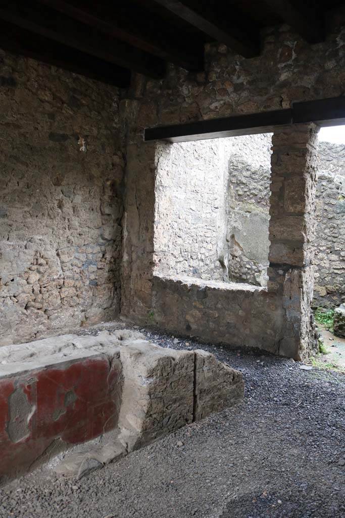 II.1.1 Pompeii. December 2018. 
Looking south-east across counter towards window in south wall. Photo courtesy of Aude Durand.
