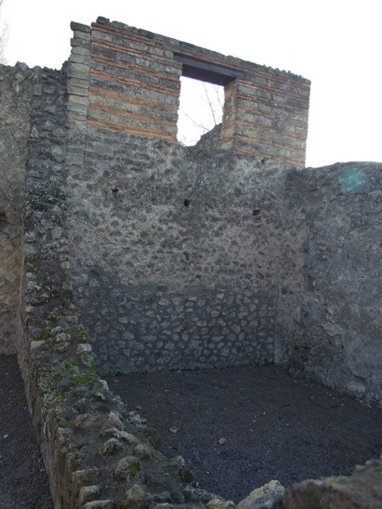 II.1.3 Pompeii.  South wall of the rear room with window in upper level.