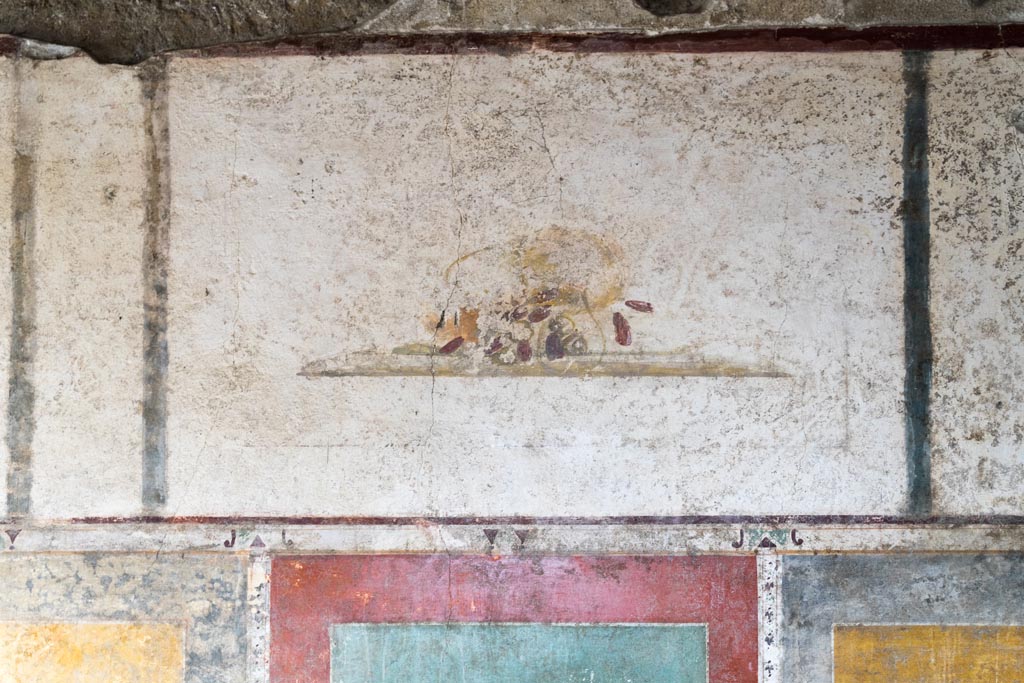 II.1.12 Pompeii. March 2009. Painted plants and heron, on lower west wall of triclinium.