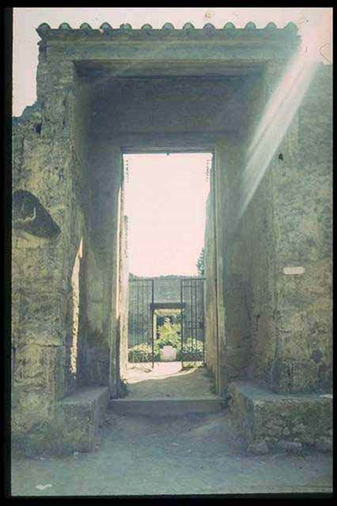 II.2.2 Pompeii. Entrance doorway.
Photographed 1970-79 by Günther Einhorn, picture courtesy of his son Ralf Einhorn.
