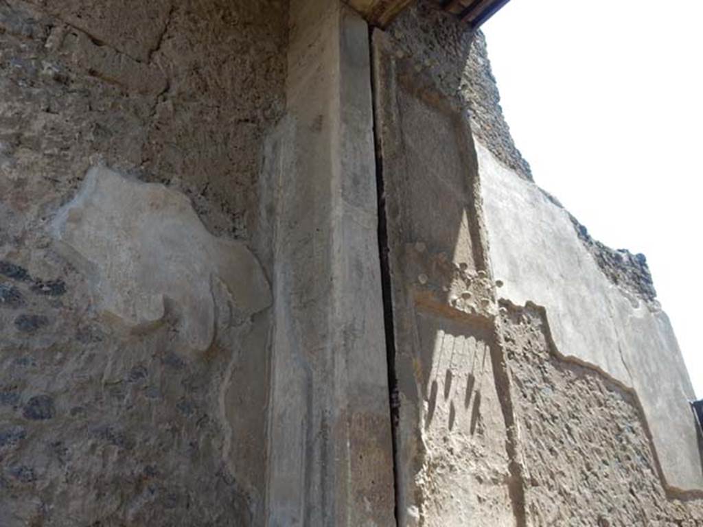 II.2.2 Pompeii. May 2016. East side of entrance doorway, with plaster cast of the shutters of the entrance doorway. 
Photo courtesy of Buzz Ferebee.

