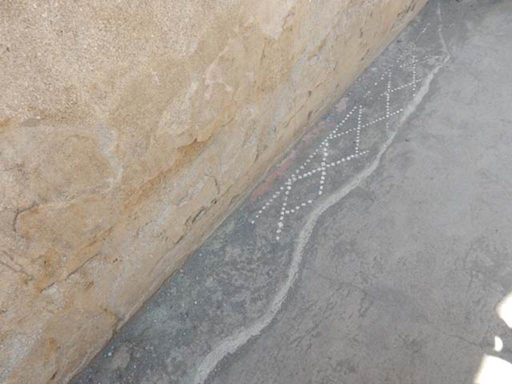 II.2.2 Pompeii. May 2016. Detail of remaining pattern in floor of entrance corridor/fauces 1.  Photo courtesy of Buzz Ferebee.
