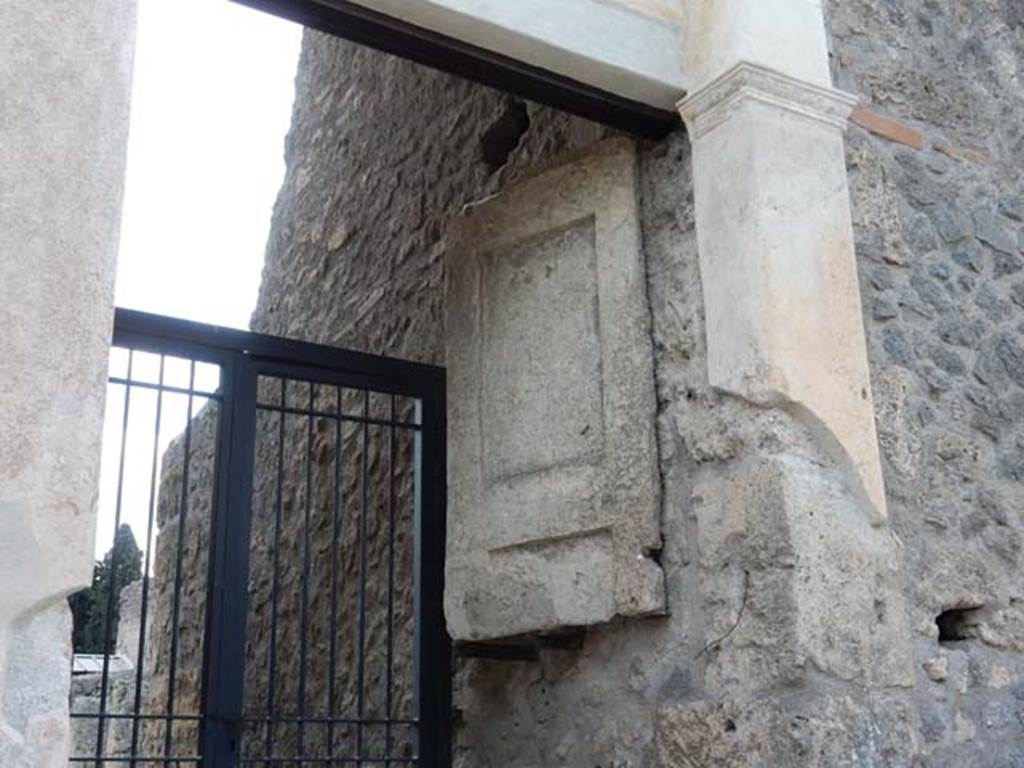 II.2.4 Pompeii. May 2016. Detail of plaster cast of remaining doorway on west side of entrance. Photo courtesy of Buzz Ferebee.
