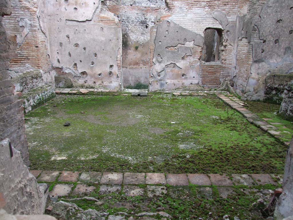 II.4.6 Pompeii. December 2006. Caldarium floor, looking east through window.