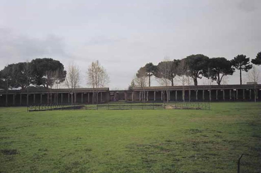 II.7.3 Pompeii. Palaestra. December 2006. View of west side and Piscina or swimming pool.