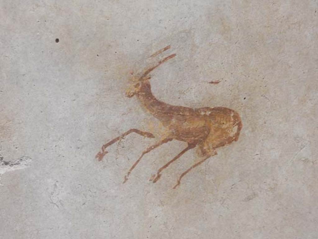 II.9.4 Pompeii. May 2018. Room 4, detail of deer from centre of panel on east wall. Photo courtesy of Buzz Ferebee. 
