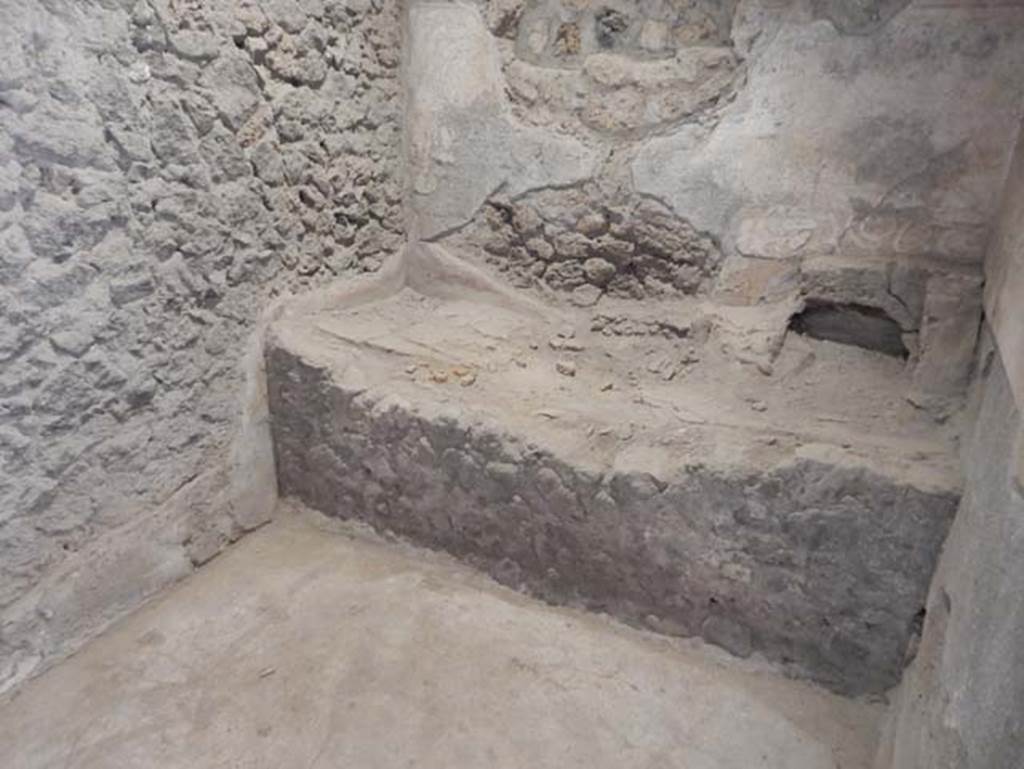 II.9.5 Pompeii, May 2018. Room 5, looking south to stone bench. Photo courtesy of Buzz Ferebee.