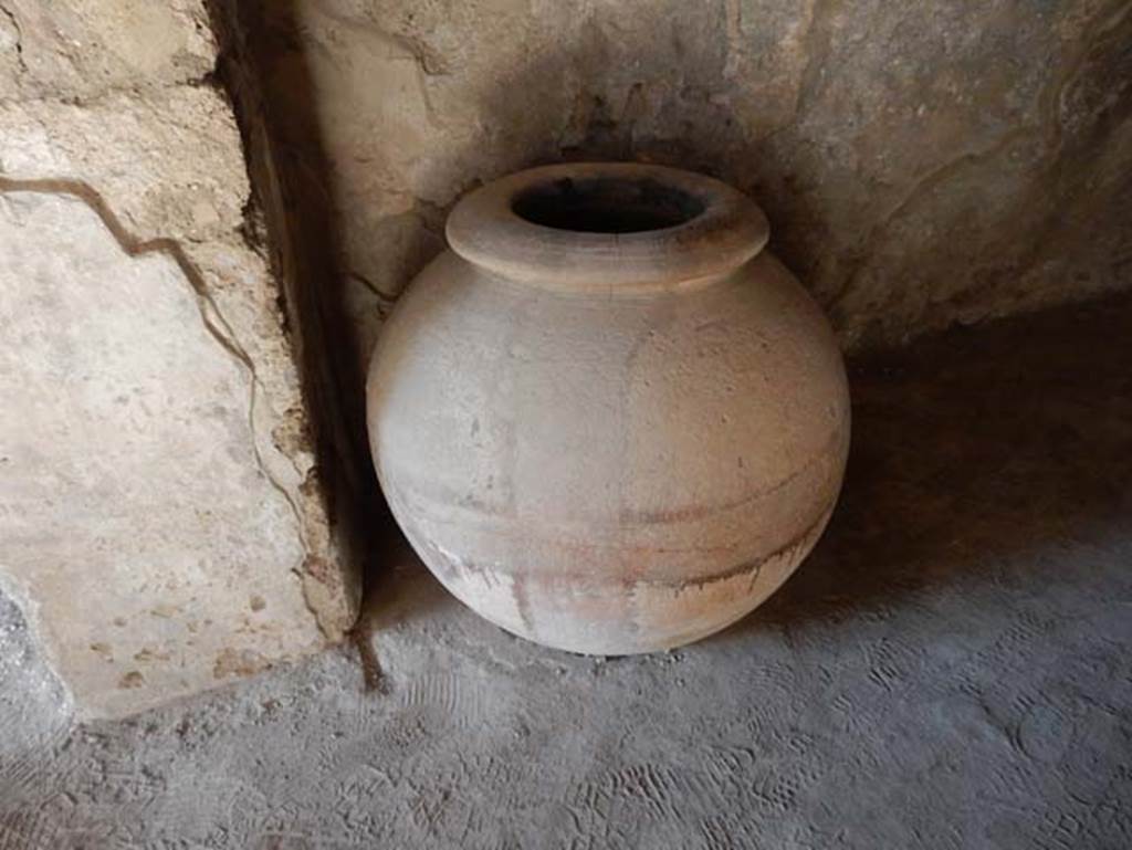 II.9.5 Pompeii, May 2018. Large terracotta dolium/pot in corridor. Photo courtesy of Buzz Ferebee.