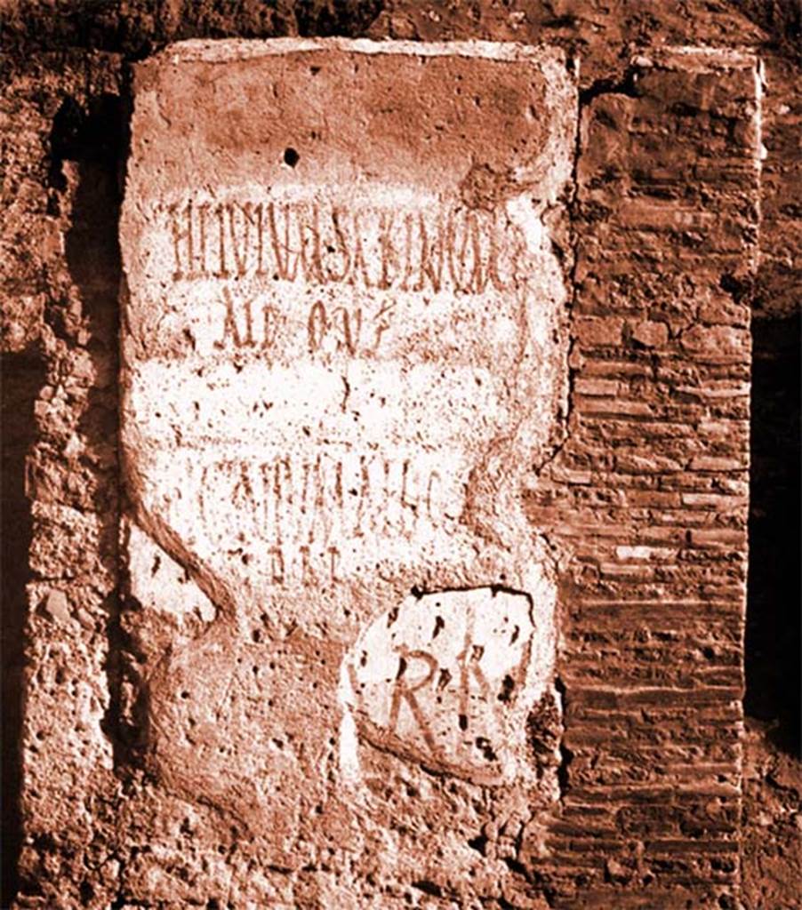 III.1.1 Pompeii. Pilaster between III.1.1 and III.1.2, with the remains of graffiti painted in red.
According to Della Corte in NdS, discovered on the simply plastered external wall, between entrances 1 and 2, was the electoral programma:
HELVIVM SABINVM AED O V F
And slightly below this also in red
LICINIVM AED O V F D R P
See Notizie degli Scavi di Antichità, 1913, p. 223.

