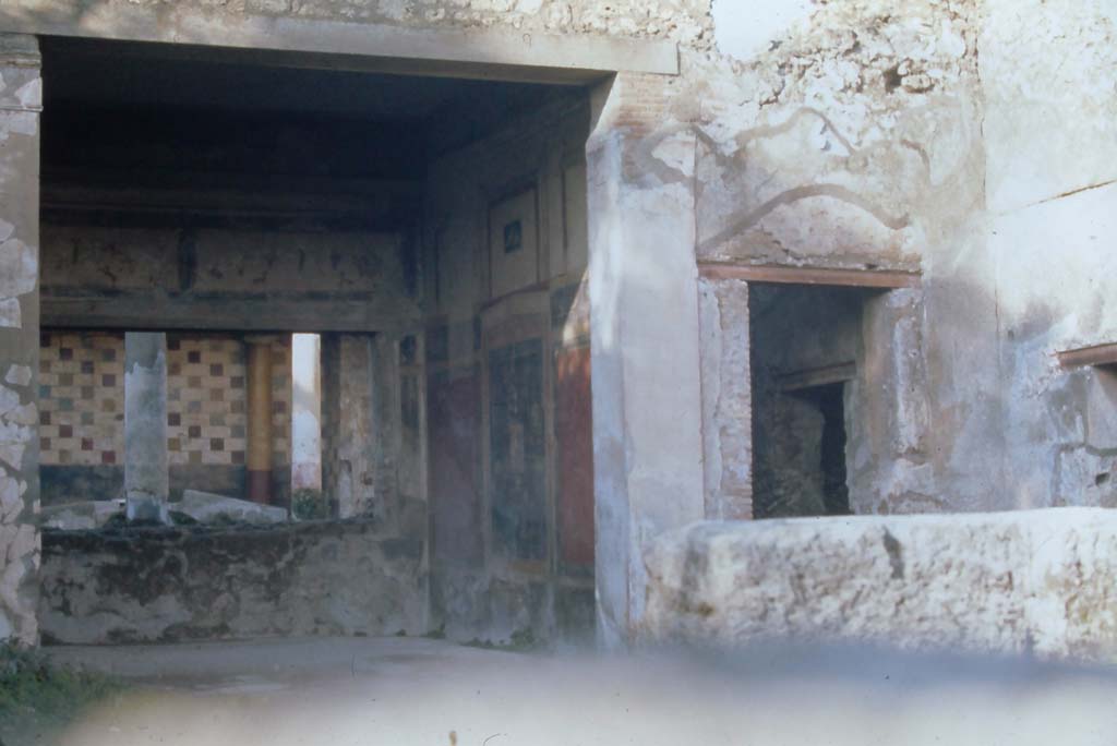III.2.1 Pompeii. 4th December 1971. Looking across atrium towards north-east corner of tablinum and east wall. 
Photo courtesy of Rick Bauer, from Dr.George Fays slides collection.

