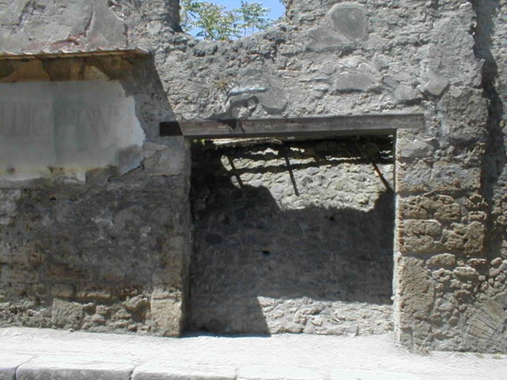 III.2.2 Pompeii. May 2005. Entrance doorway, partly excavated.
According to Della Corte, two of the many writings found to the left of the entrance doorway, were
Trebi  et  Soteriche, vigilate    [CIL IV 7632]
Trebius  nec  sine  (Soterico?)    [CIL IV 7627]
He thought these proved that Sotericus was a near neighbour to Trebius Valens.
See Della Corte, M., 1965.  Case ed Abitanti di Pompei. Napoli: Fausto Fiorentino. (p.345)
According to Epigraphik-Datenbank Clauss/Slaby (See www.manfredclauss.de), these read as -

L(ucium)  Popidium  L(ucium)  f(ilium)  Ampliatum  aed(ilem)  o(ro)  te  fac(ias) 
Trebi  et  Soteriche  {et}  vigilate     [CIL IV 7632]

L(ucium)  Ceium  Secundum 
IIvir(um)  o(ro)  v(os)  f(aciatis)  Trebius  nec  sine     [CIL IV 7627]

