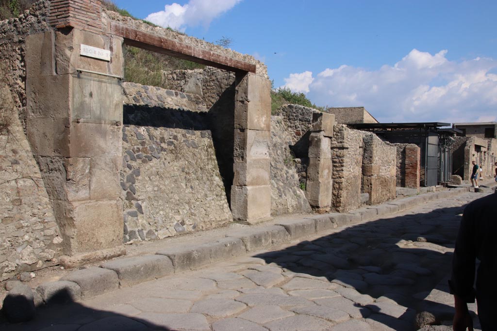 III.3.1 Pompeii. October 2022. Looking towards entrance doorway, centre left, on north side of Via dell’Abbondanza. Photo courtesy of Klaus Heese