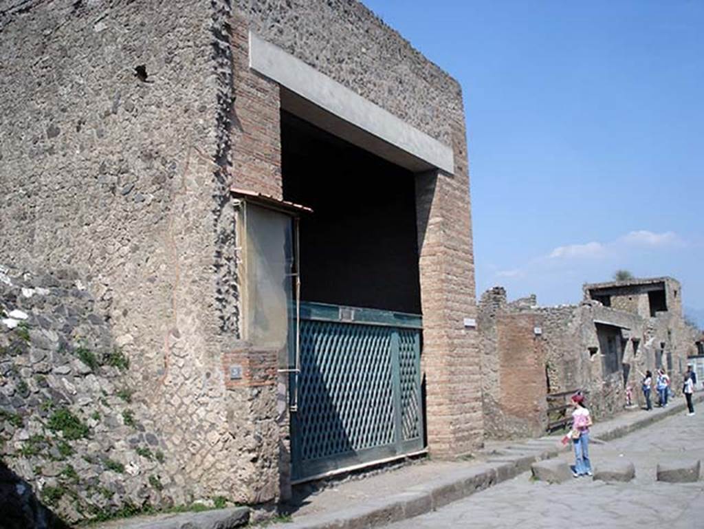 III.3.6 Pompeii. April 2008. 
Entrance, with reproduction of the original type of doorway gate.
Photo courtesy of Giles Gaffney.
