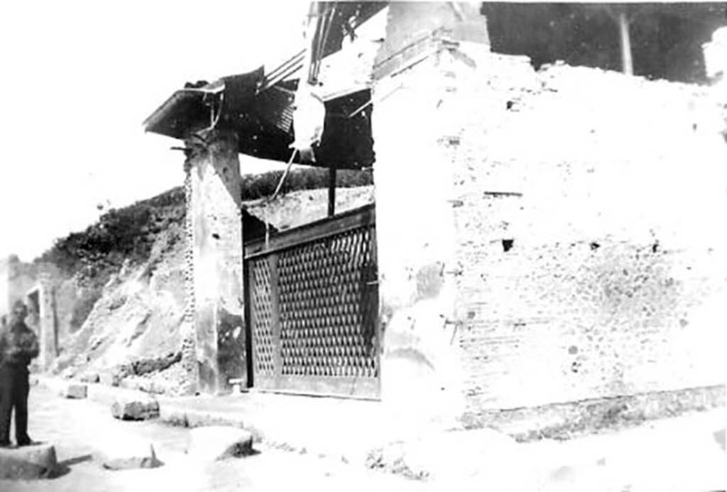 III.3.6 Pompeii. 1944. Bomb damage. Photo courtesy of Rick Bauer.

According to Garcia y Garcia, the same bomb that damaged the nearby shops at III.3.3, 4 and 5 also damaged this west wall.
This led to the total loss of the IV style wall paintings on the west wall.
The two beautiful trophy wall paintings on the left and right pilasters of the entrance, were also affected.
The one on the right was totally annihilated whereas the one on the left was partly saved but is now badly faded and unreadable (in 2006 when book written).
A plastercast of a cupboard against the wall to the right of the entrance, together with the partial plastercast of the impression of the doorway gate were destroyed.
See Garcia y Garcia, L., 2006. Danni di guerra a Pompei. Rome: L’Erma di Bretschneider. (p.53-55 with photos)
