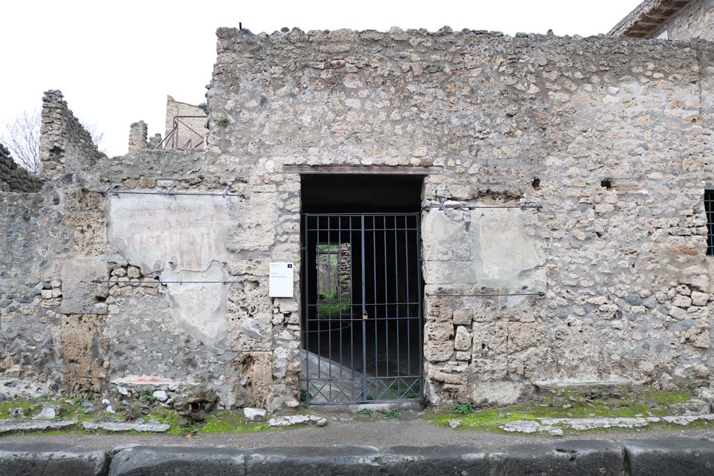 III.4.3 Pompeii. December 2018. Looking north on Via dell’Abbondanza towards entrance doorway. Photo courtesy of Aude Durand.