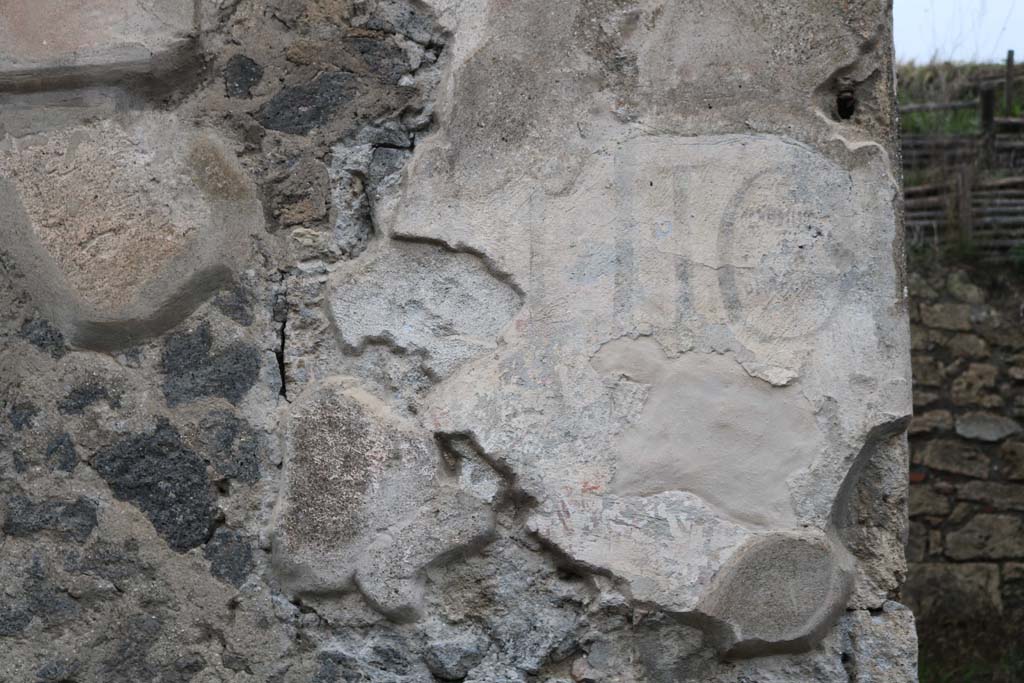 III.6.1 and III.6.2 Pompeii. December 2018. 
Front façade, east of III.6.1 and west of III.6.2, detail of painted inscription. Photo courtesy of Aude Durand.



