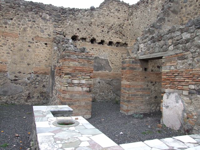 V.1.1 Pompeii. October 2020. Looking towards doorways to room in north-east corner, and one in east wall. Photo courtesy of Klaus Heese.