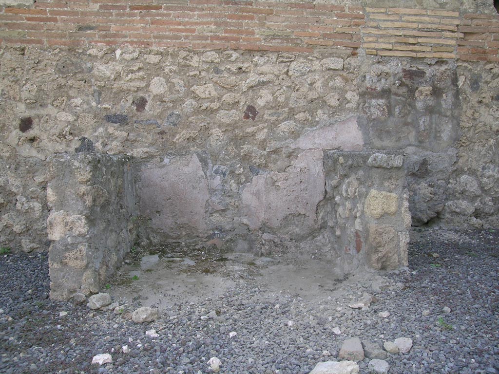 V.1.2 Pompeii. June 2005. Looking west towards podium, or possible part of a basin/vat. Photo courtesy of Nicolas Monteix.