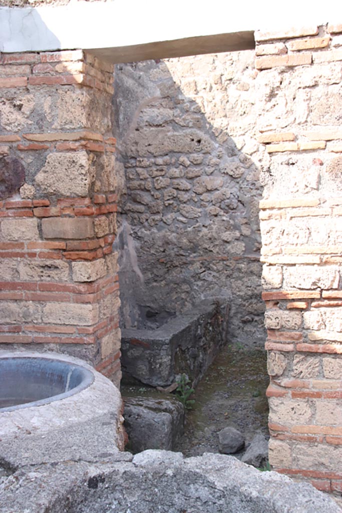 V.1.4 Pompeii. October 2023. 
Doorway to rear room in north-west corner. Photo courtesy of Klaus Heese.
