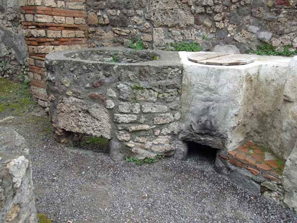 V.1.4 Pompeii. May 2010. Boilers or kettles on east side.