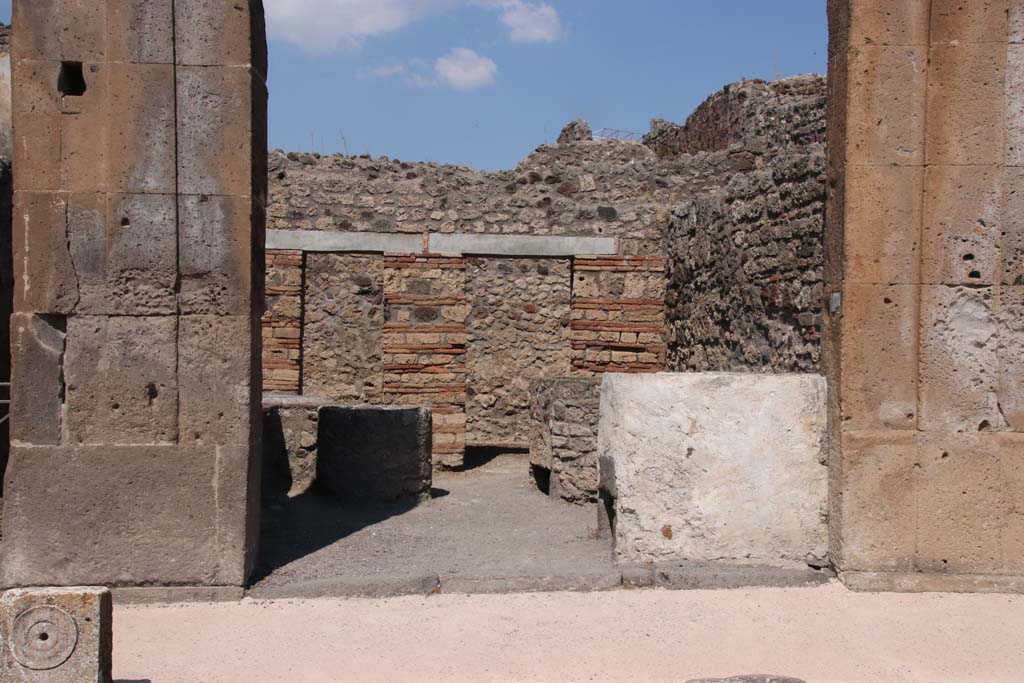 V.1.4 Pompeii. September 2021. Looking towards entrance doorway on north side of Via di Nola. Photo courtesy of Klaus Heese.
