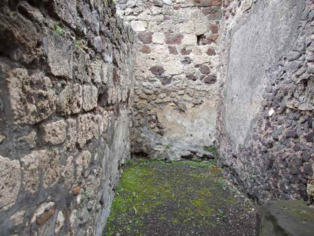 V.1.5 Pompeii. May 2010. Rear room with latrine and steps to upper floor, looking north