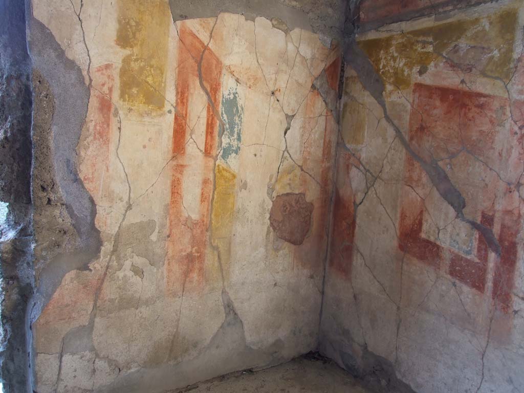 V.1.7 Pompeii. December 2007. Room 12 painted west wall and north-west corner of cubiculum.