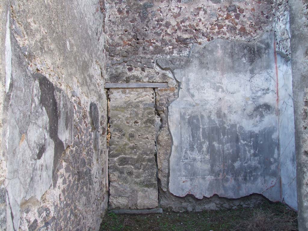 V.1.7 Pompeii. December 2007. Blocked doorway in west wall of room 6, leading to V.1.3.
