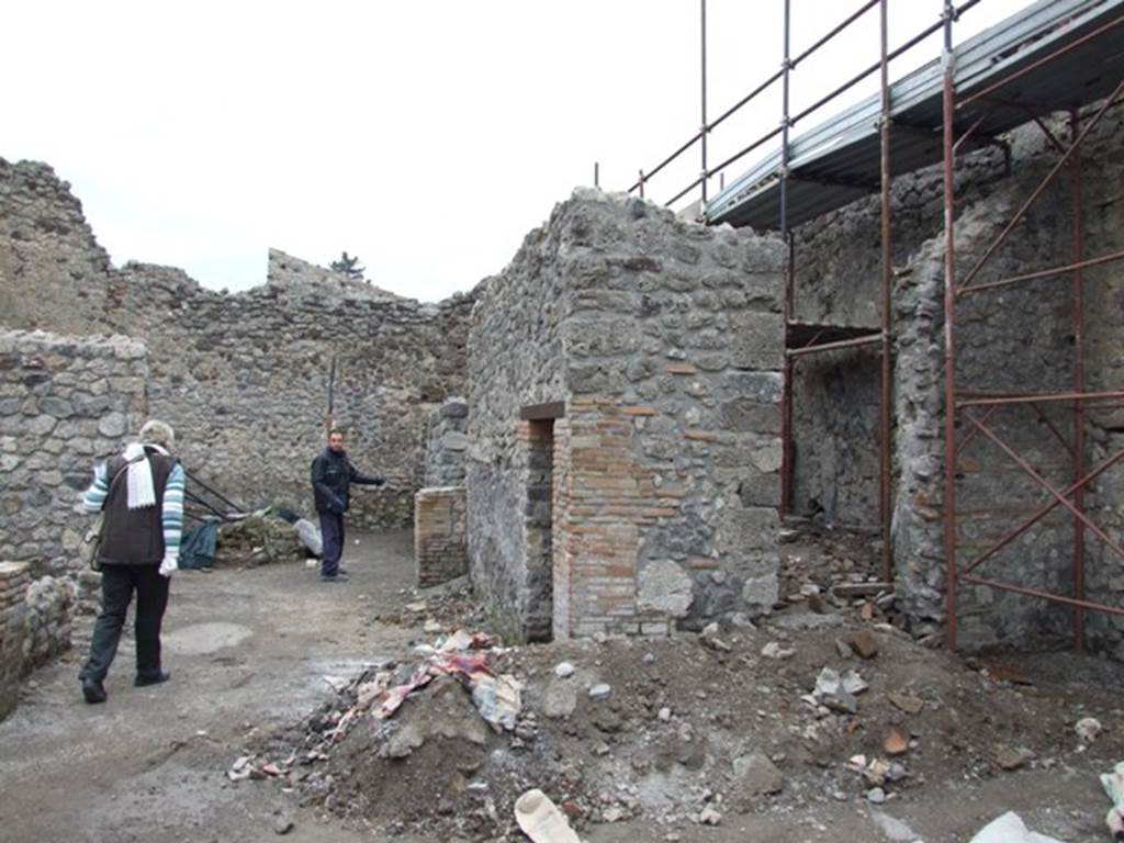 V.1.15 Pompeii.  Private House incorporating bakery.   December 2007.  South east corner of bakery, under restoration.