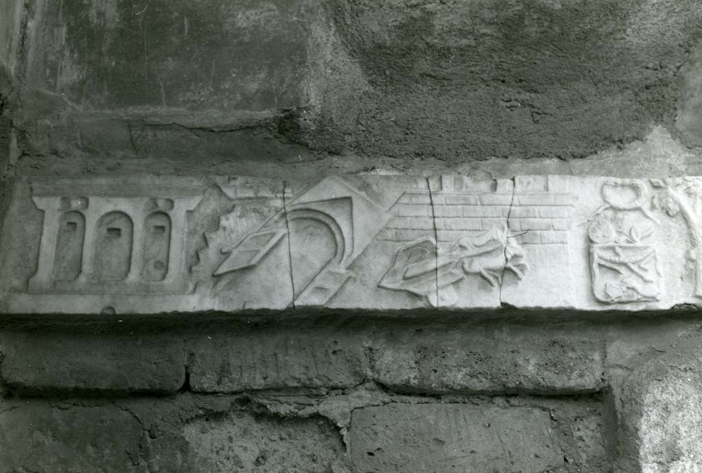 V.1.26 Pompeii. 1968. Domus L. Caecili Iucundi, Lararium earthquake frieze. Photo courtesy of Anne Laidlaw.
American Academy in Rome, Photographic Archive. Laidlaw collection _P_68_9_4.
