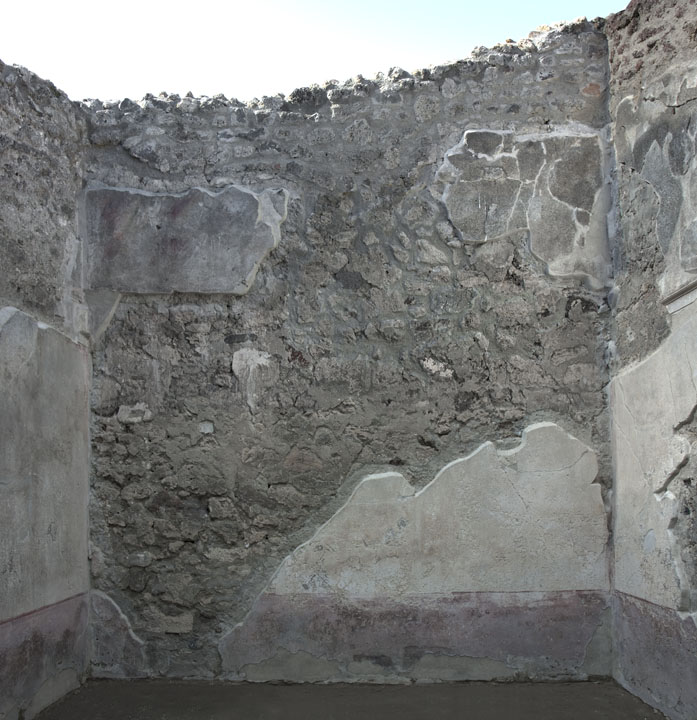 V.1.26 Pompeii. October 2023. 
Room 4, north ala, looking towards north wall with passageway to V.1.23 at west end. 
Photo courtesy of Johannes Eber.
