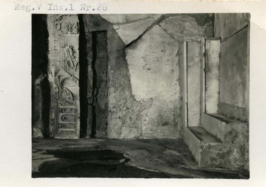 V.1.26 Pompeii. 1937-39. Room 1, atrium. Looking towards north-west corner, with marble lararium. Photo courtesy of American Academy in Rome, Photographic Archive. 
Warsher collection no. 1562
