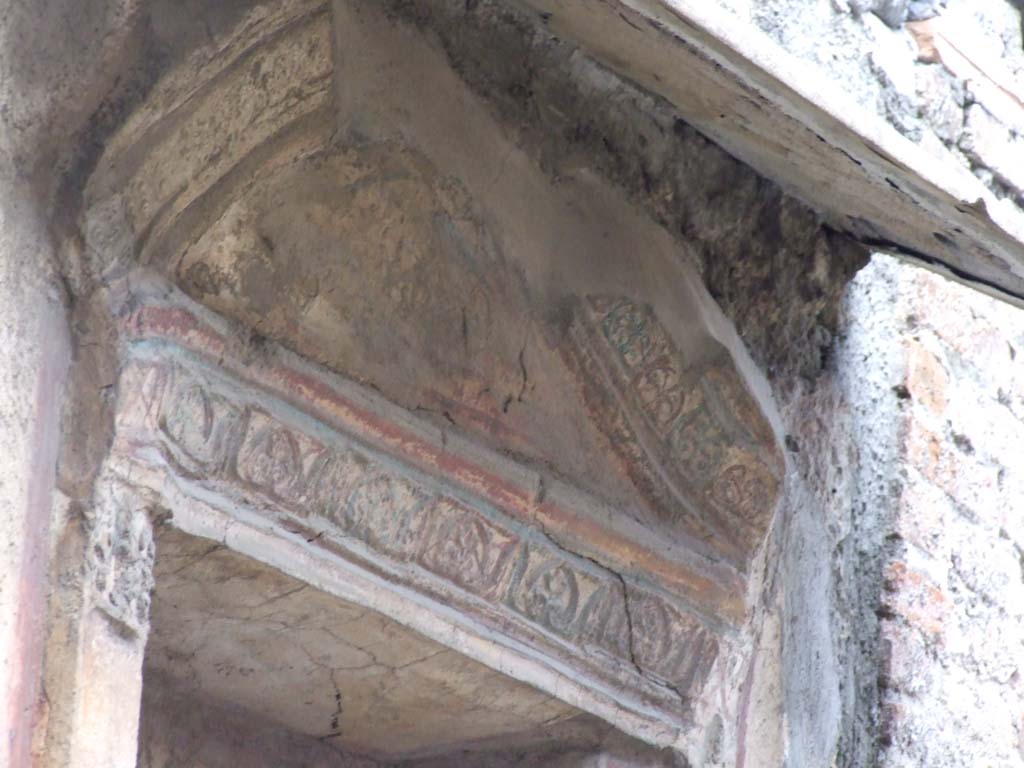 V.1.28 Pompeii. March 2009. Stucco on niche.