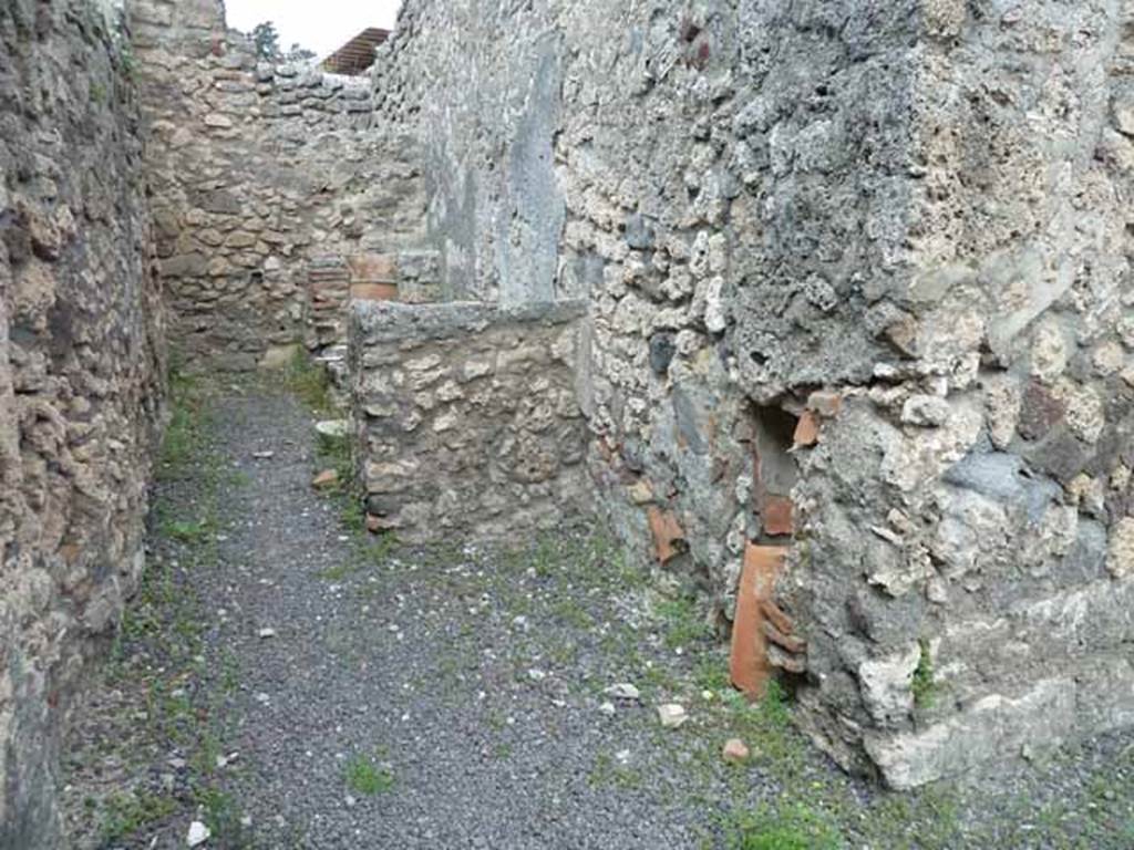 V.2.9 Pompeii. May 2010. Looking north in rear room. The north wall has a small window to V.2.10, and the site of stairs to upper floor against the east wall.
