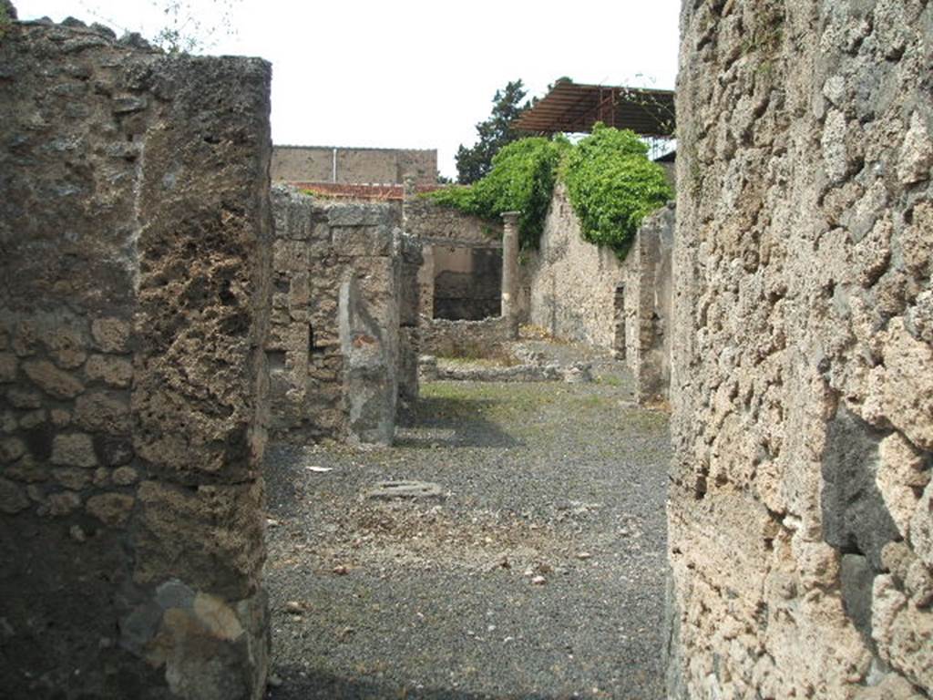 V.2.10 Pompeii. September 2005. Looking across atrium and impluvium to peristyle, from entrance corridor.