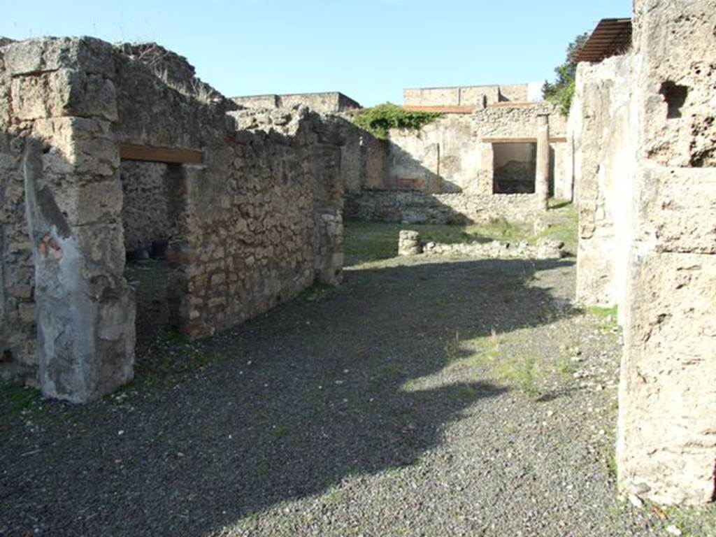 V.2.10 Pompeii. December 2007. Room 3, tablinum with doorway to room 7 on left. Looking north from atrium.
