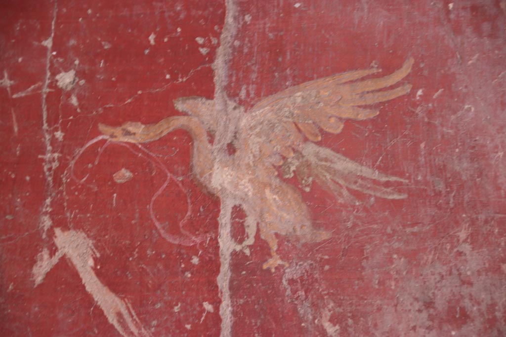 V.2.i Pompeii.  October 2023. Corridor 10, east wall at south end, detail of painted bird. Photo courtesy of Klaus Heese.