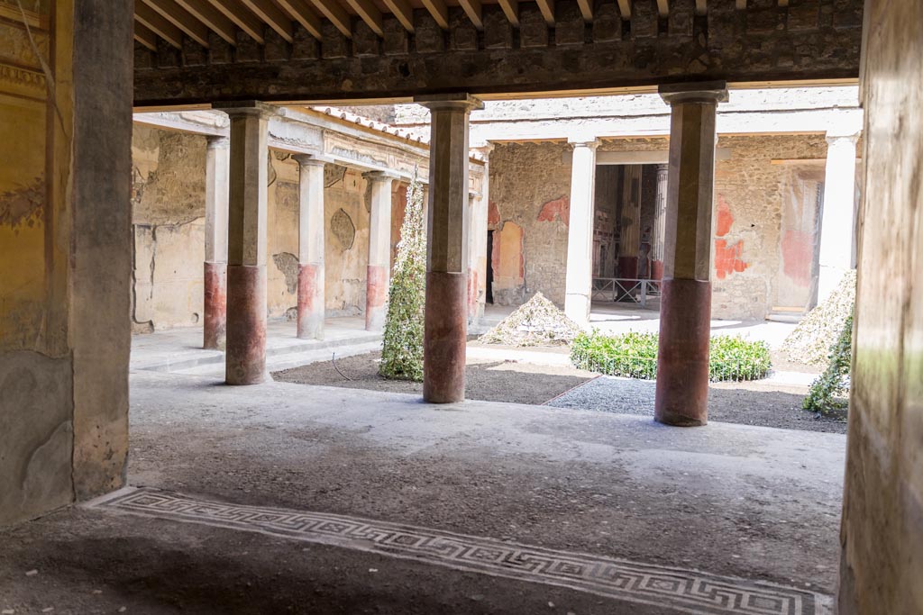 V.2.i Pompeii. March 2023. Room 21, Corinthian oecus, looking east from portico. Photo courtesy of Johannes Eber.

