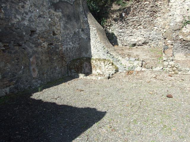 V.3.2 Pompeii. May 2010. North-west corner of workshop, remains of water-basin.