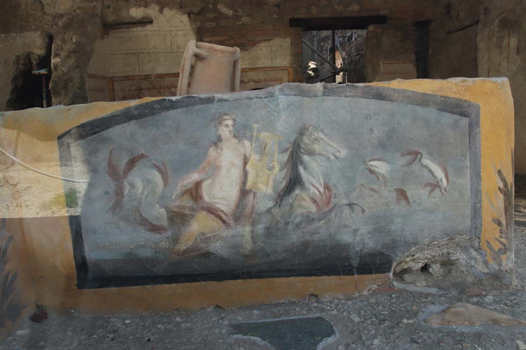 V.3, Pompeii. September 2021. 
Looking south towards painted counter showing a Nereid on a seahorse, in bar-room. Photo courtesy of Klaus Heese.
