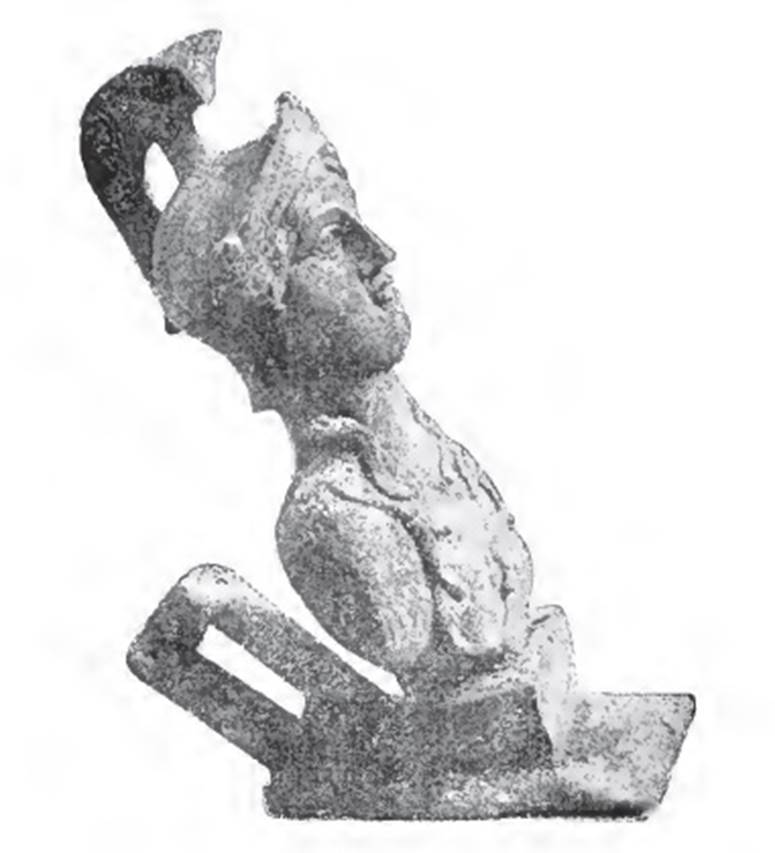 V.4.9 Pompeii. 1899. Bronze bust of Minerva found in the Lararium niche.
