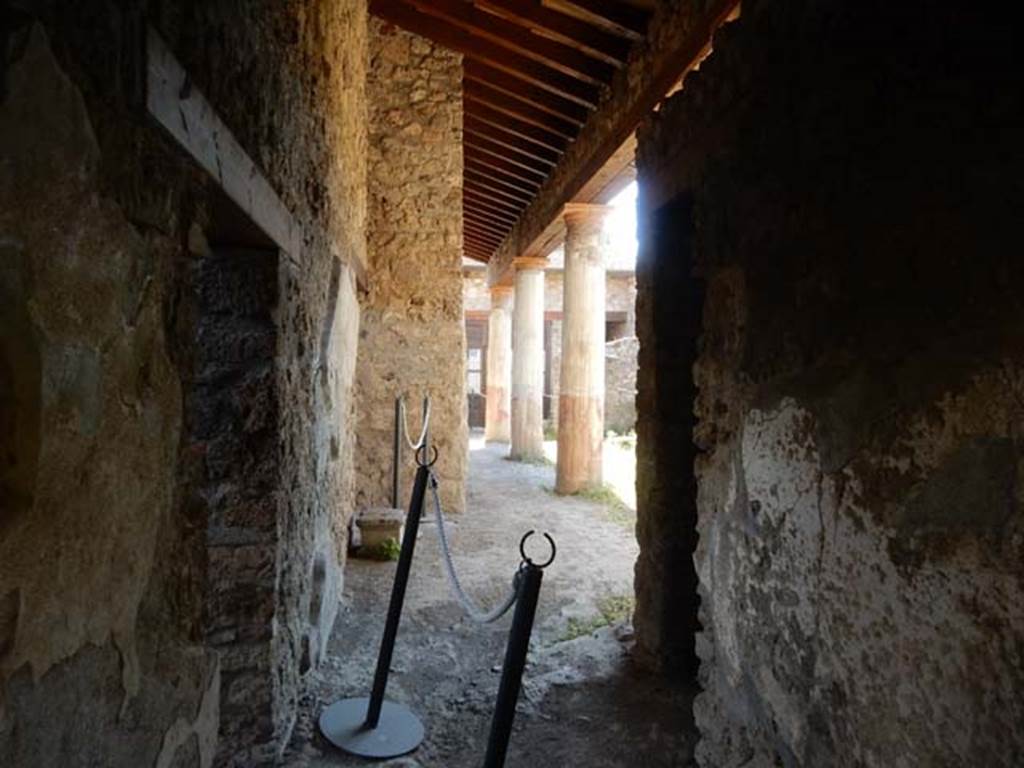 V.4.11 Pompeii. May 2017. Looking west from entrance doorway into garden “l” with rooms “v” left and “x” right. Photo courtesy of Buzz Ferebee.
