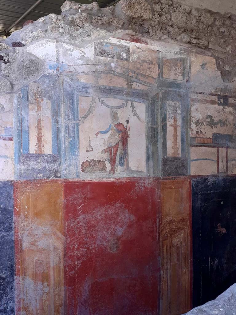 V.6.12, Pompeii. January 2020. Detail of upper north wall of fauces/ entrance corridor. Photo courtesy of Johannes Eber.