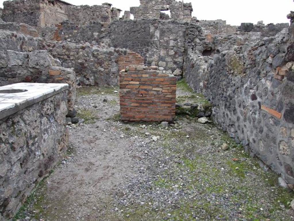 VI.1.17 Pompeii. December 2007.  Looking to rear with room for the customers on left and corridor on the right leading to the latrine.
