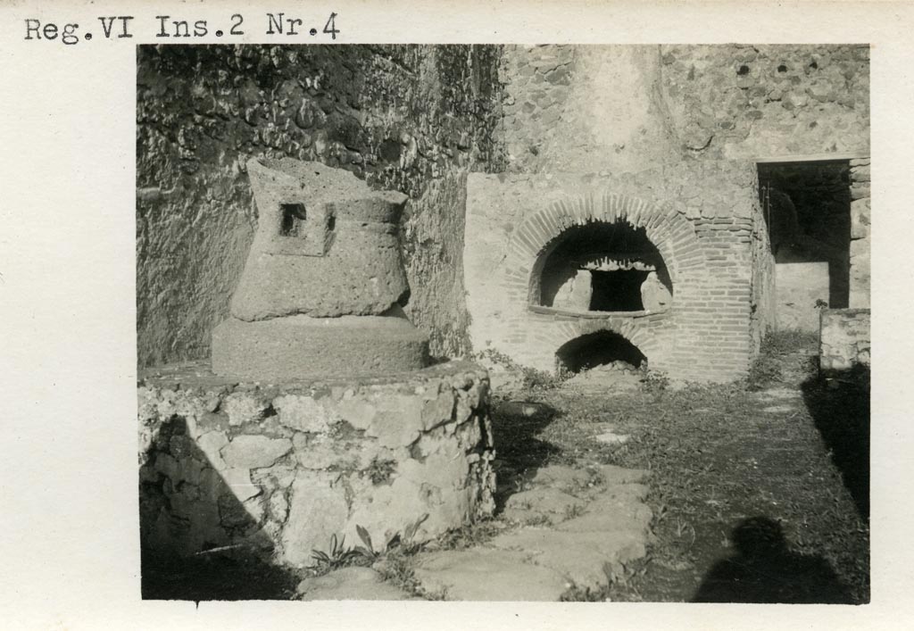 VI.2.6 Pompeii but numbered as VI.2.4 on photo. Pre-1937-1939. Looking east to mill, oven and doorway to rear room.
Photo courtesy of American Academy in Rome, Photographic Archive. Warsher collection no. 252.
