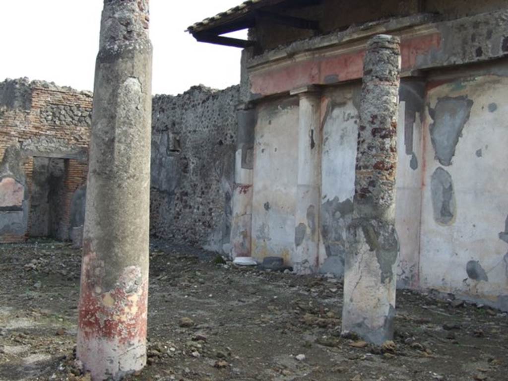 VI.5.5 Pompeii. December 2007. Looking south-east across peristyle, from west portico. See also VI.5.21.  
According to Fiorelli, the garden area was enclosed by a portico on the west, north and east sides.
In the middle of the garden was a pergola supported by four small slender columns painted with leaves and scales. 
According to Jashemski, on the south wall was a painted garden scene, divided into three panels by the half-columns.
Near this wall were three masonry pedestals, on which three statuettes were found on March 31st 1837.
The statuettes were described in PAH as showing –
Hercules (0.60m high without base) with a gnarled club, a lion skin and with the three apples of the Hesperides;
A Bacchus with a cup in one hand, a thyrsus in part missing, in the other hand, and a panther at his feet (0.71m high without the base);
A third, perhaps Flora, partly broken (0.77, high, without the base, if complete).
Schulz described one of the statuettes as Silenus (Bacchus?), identical to the one found in the House of the Grand Duke of Tuscany.
He says that all the statuettes were given to the Grand Duke Mikhail.
See Jashemski, W. F., 1993. The Gardens of Pompeii, Volume II: Appendices. New York: Caratzas. (p.125-6).
See Fiorelli G., 1862. Pompeianarum antiquitatum historia, Vol. 2: 1819 - 1860, Naples, p. 334 (March 31, 1837).
See Fiorelli, G., 1875. Descrizione di Pompei. Napoli, p.98.
See Schulz, in Annali dell’Instituto di corrispondenza archeologica (DAIR), (1838), p.185-186, 191.
