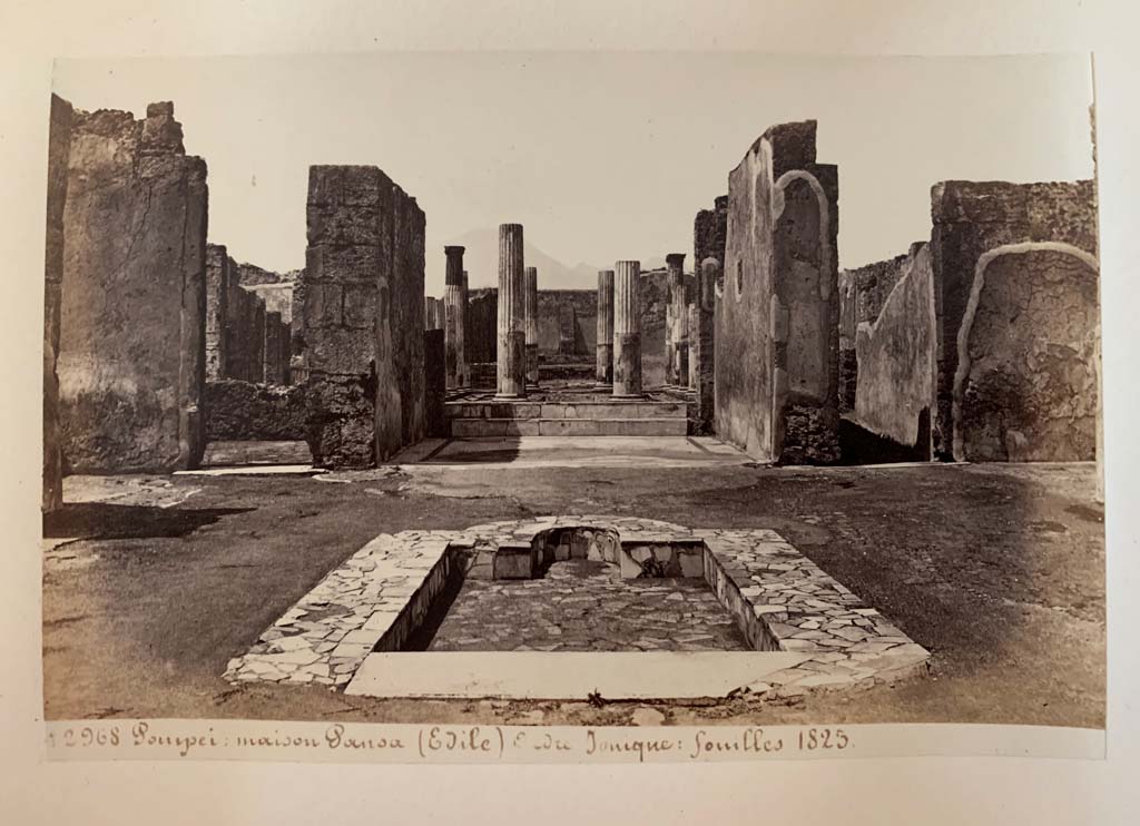 VI.6.1 Pompeii. Album by M. Amodio, c.1880, entitled “Pompei, destroyed on 23 November 79, discovered in 1748”.
Looking north across impluvium in atrium to peristyle. Photo courtesy of Rick Bauer.
