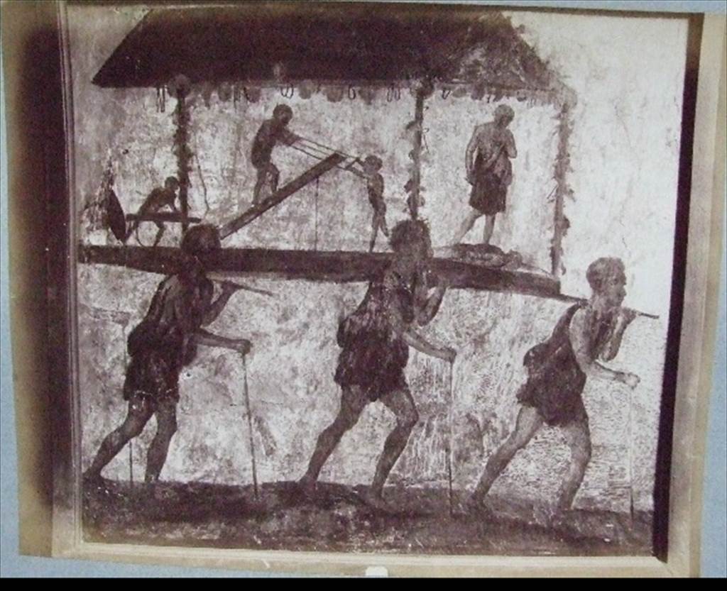 VI.7.8 Pompeii.  Wall painting of the Procession of the Carpenters.   Originally found on pilaster between entrances VI.7.8 and VI.7.9.  Old undated photograph courtesy of the Society of Antiquaries, Fox Collection.

