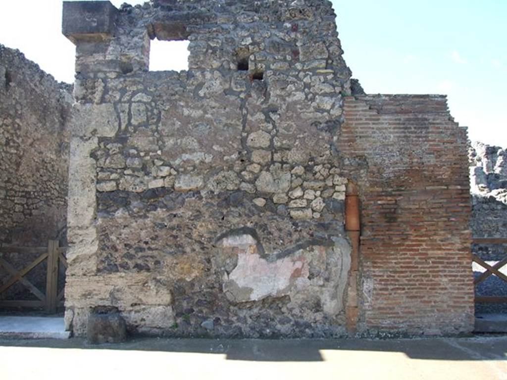 VI.7.9 Pompeii. March 2009. Exterior front façade on north side of entrance doorway.